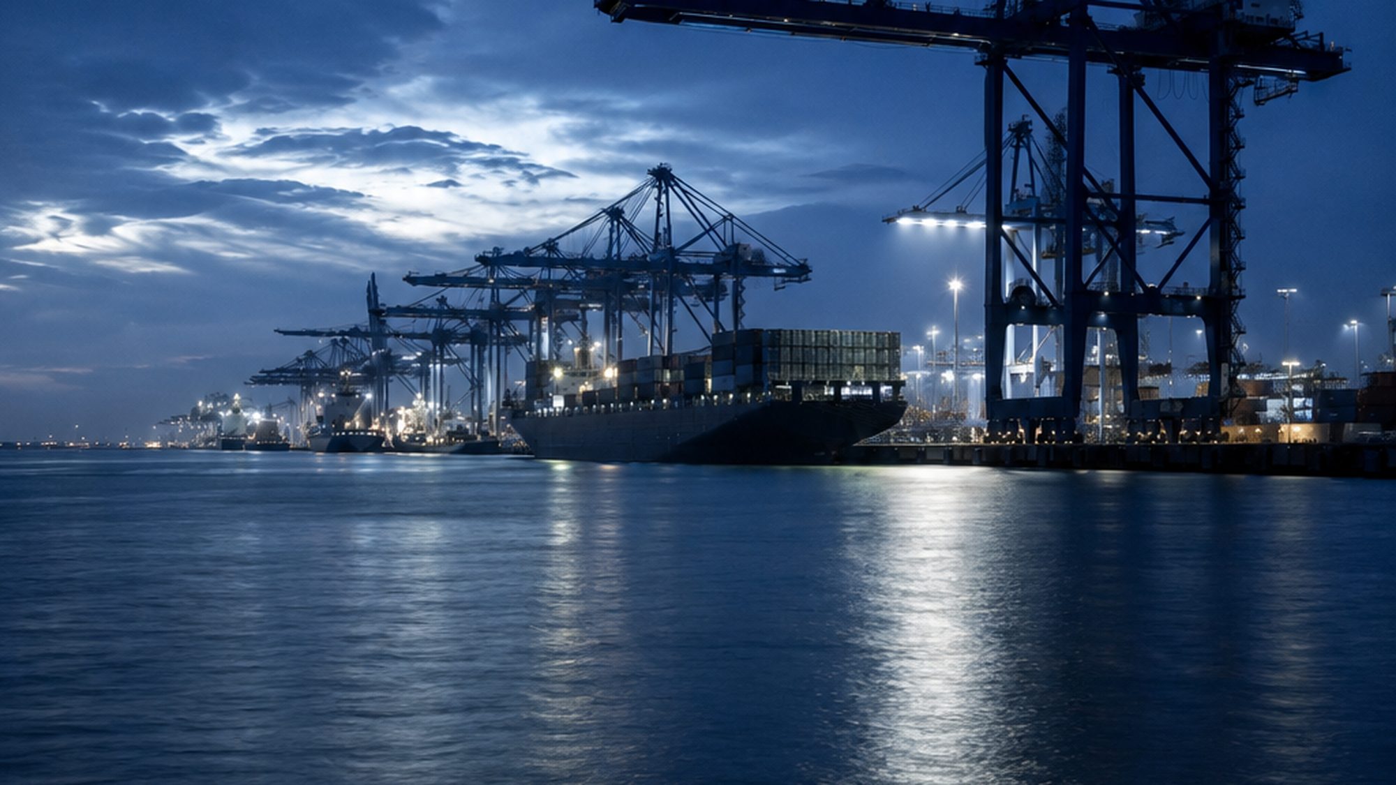 A vessel alongside at a working marine terminal at first light