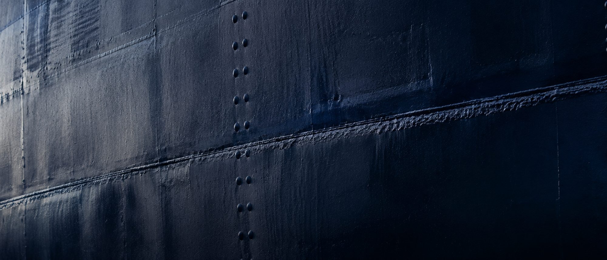 A steel hull section under construction in a fabrication yard